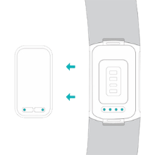 Tracker with arrows indicating how it should be connected to the charger